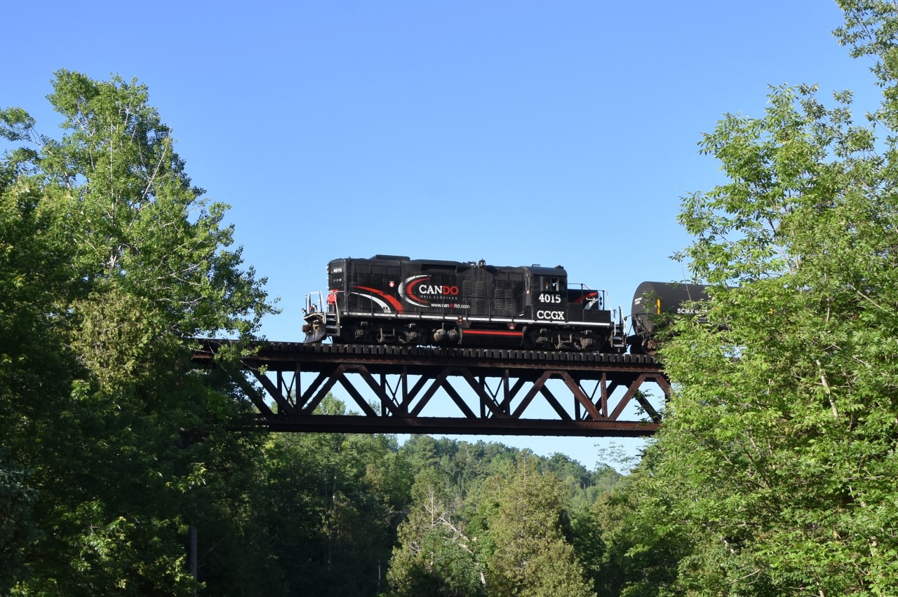Now on its final run ever to Streetsville and back, CCGX 4015 is seen passing over the Forks of the Credit trestle bridge in Brimstone ON with the bi-weekly freight movement.  After today’s run, word has it that tomorrow June 30th, 4015 will run light to Mississauga and not return north. Next train to grease the rails after that will be under Trillium. Word also has it that the schedule of running Tuesday and Friday will remain the same for the time being.