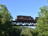 Now on its final run ever to Streetsville and back, CCGX 4015 is seen passing over the Forks of the Credit trestle bridge in Brimstone ON with the bi-weekly freight movement. <br> After today’s run, word has it that tomorrow June 30th, 4015 will run light to Mississauga and not return north. Next train to grease the rails after that will be under Trillium. Word also has it that the schedule of running Tuesday and Friday will remain the same for the time being. 