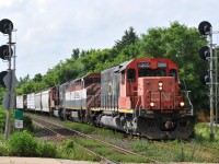 CN 5366, BCOL 4601, and CN 5758, leading train 398 through Hardy with 170 cars.
  

5366 was built in 1973 as MP 807 and would later become MP 3107, UP 4107, and CN 6107
