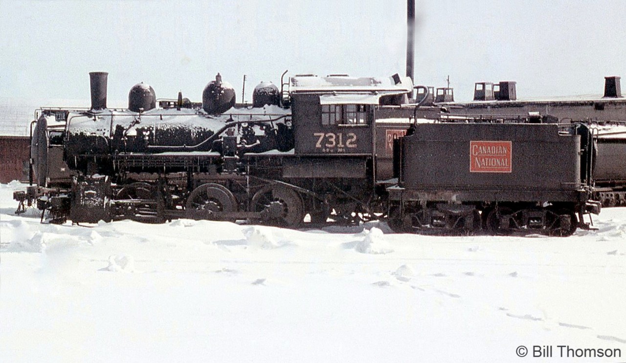 Another view of CN's Stratford shop engine 7312 (Baldwin 0-6-0 built in 1908 for the Grand Trunk Railway) parked removed from service outside Stratford Shops in March of 1960. The 7312 managed to escape the scrapper's torch, and still operates today on the Strasburg Railroad in Pennsylvania as CN 7312.