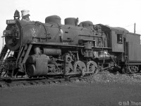 Canadian National 0-8-0 switcher 8386 sits dead with her stack capped at Mimico in 1955. Built at CN's Pointe St. Charles shop at part of the P5h-class of units (8382-8146) in 1930, the 8386 was scrapped later that year in November of 1955.