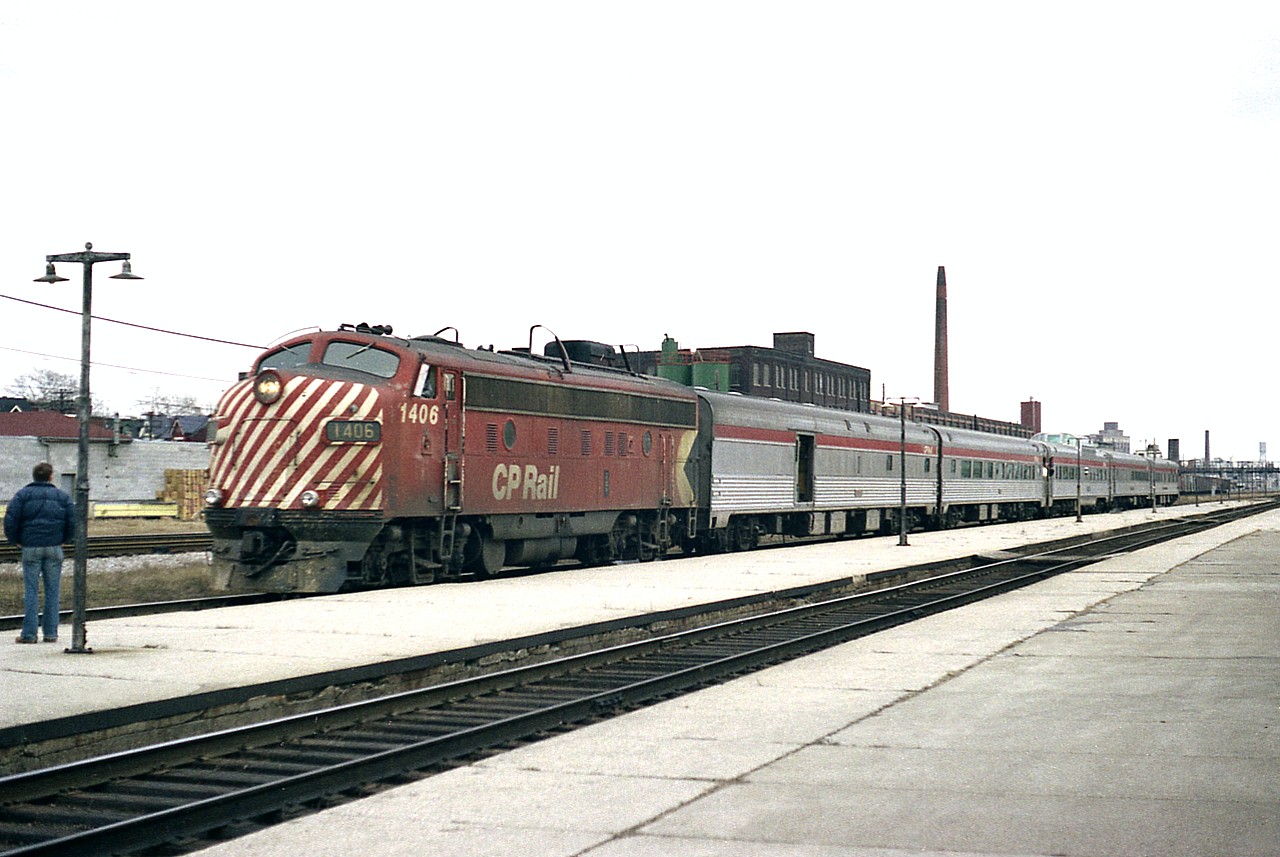 Back in what I like to call 'heady days' of passenger trains for me to photograph, we see CP 1406 ready to depart northward to Sudbury where this train would meet up with #1-11 out of Montreal and combine to become #1,westward to Vancouver. The "Canadian" ran daily. At the time, CN's counterpart, "The Super Continental", also crossed Canada daily. Not quite a year previously from the date of this photo VIA was formed, and in October of '76 the first CN-CP joint timetable under "VIA" came into being. And the slashing of duplication began.................