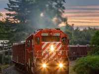 With an empty ballast train in tow, this 1985-built workhorse races along the mainline pushing every bit of a mile a minute. 