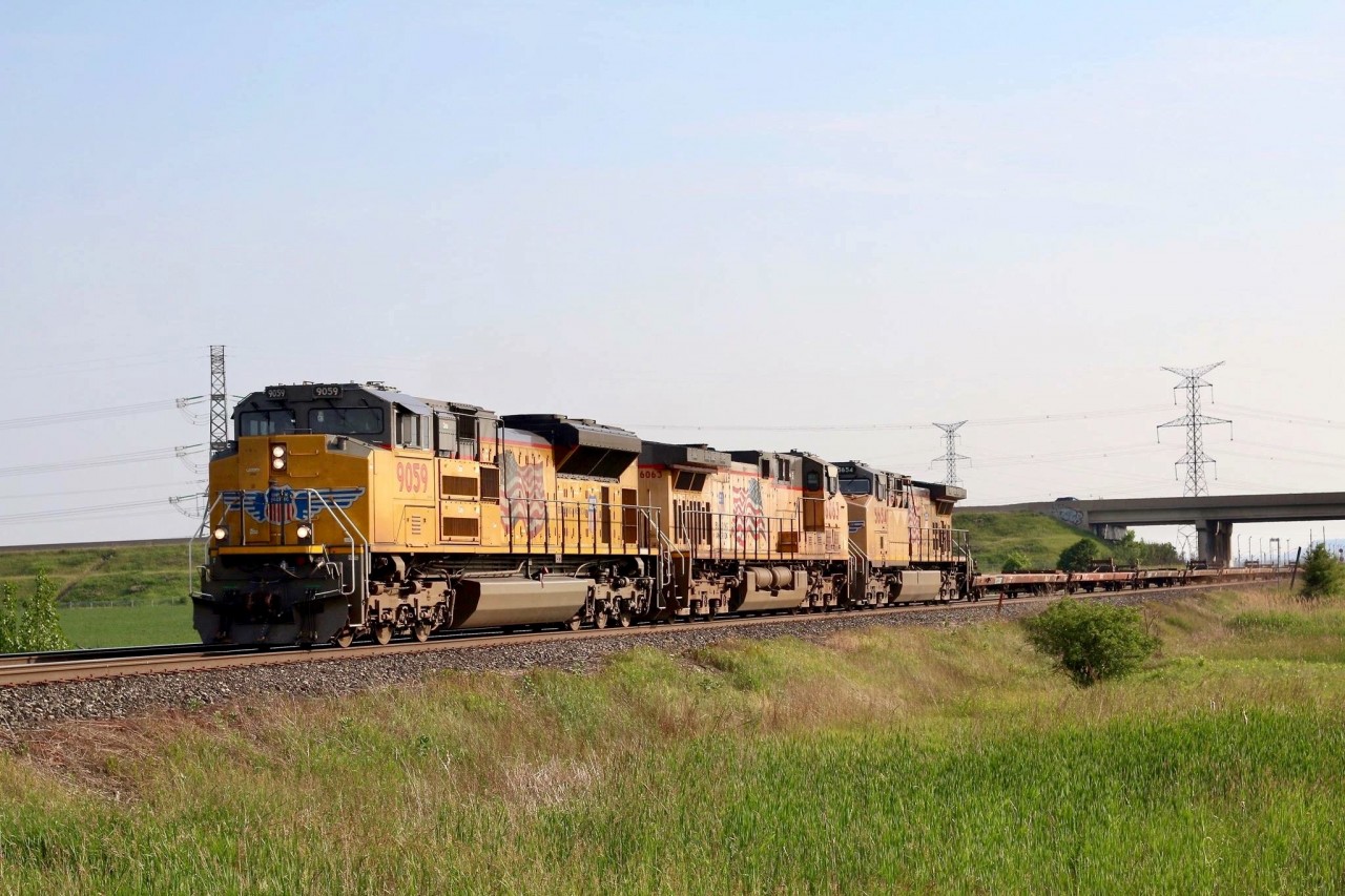 I wasn’t planning on Railfanning on Father’s Day, but some things get you off your butt :) The chance to shoot a trio of Union Pacific units in Ontario is a pretty good reason especially if the power isn’t all GE built GEVO’s. Hornby East isn’t the most photogenic location but when shooting eastbounds in the afternoon you have to pick your locations wisely. Train DIM016 is an empty wind turbine train out of Texas and is most likely returning the empty flats to Quebec. It’s interesting that three units were assigned to the train considering that one unit would have been more then enough power.