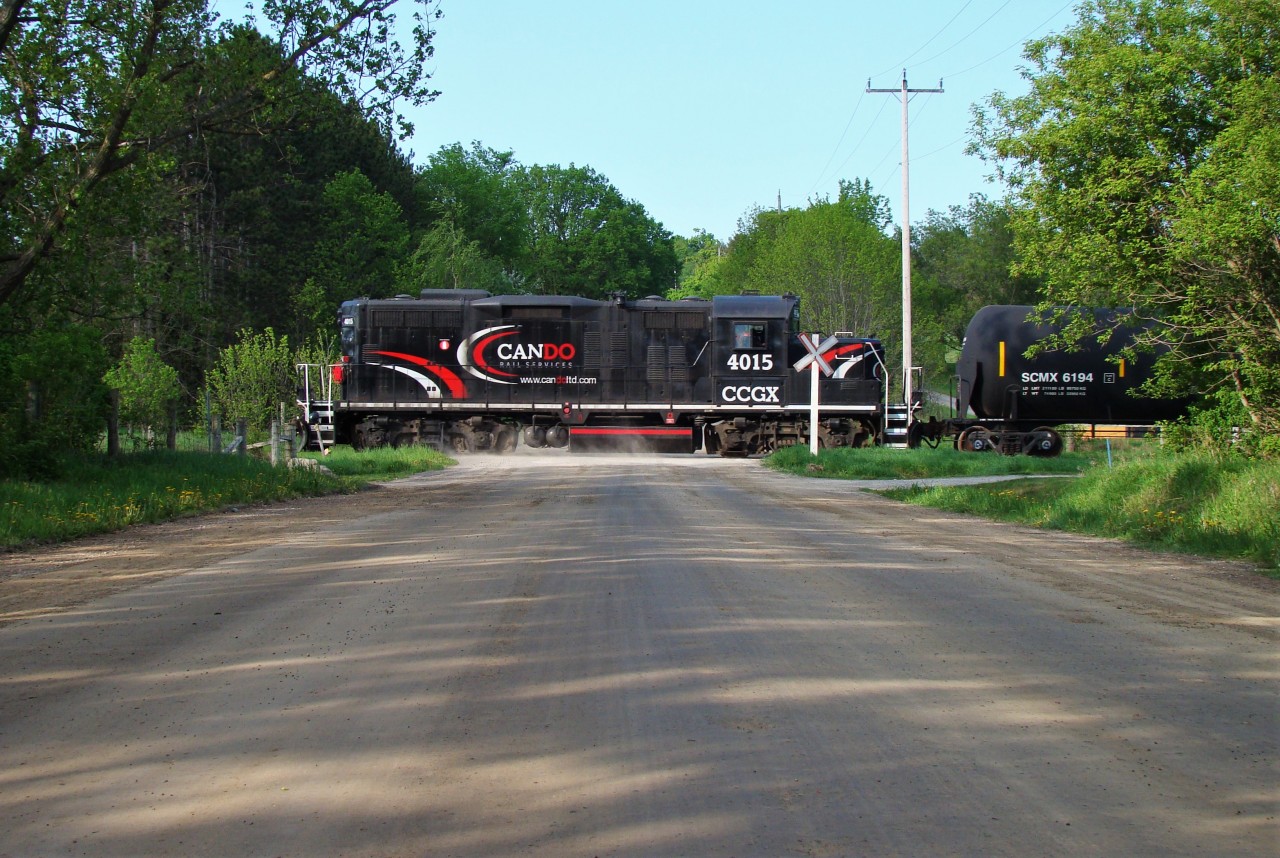 CCGX 4015 rumbles through Osprey Valley Golf Course not long after departing Orangeville on a beautiful May morning. A detour led us to this spot on Beachgrove Side Rd. as it intersects the golf course.