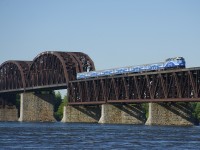 AMT 1347 has six Comet cars in a matching paint scheme as it crosses CP's bridge over the St. Lawrence River on its way to Montreal.