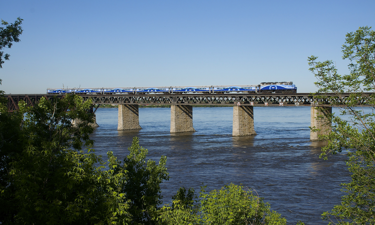 AMT 1340 pushes a six-car trainset back towards the South Shore of Montreal so that it can bring more commuters to Montreal during the morning rush hour.