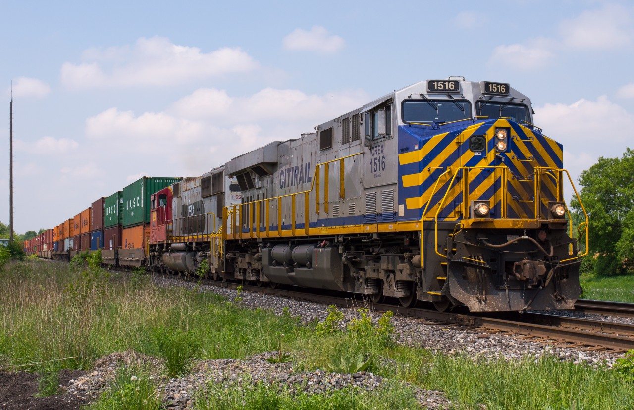 With photos of the first new CN GEVO's being released from Fort Worth, consists like this will slowly begin to become a thing of the past on CN.  We still have lots of time, but I know I will certainly be getting my shots while I can.  Here we see CN Q148 with CREX 1516 and PRLX 288 slowly rolling through Lynden as they approach Copetown West where they will have to wait on CN E271 and Via 72.