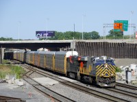 ES44AC's CREX 1522 & CN 2864 lead CN 401 through Turcot West, underneath a recently completed section of highway.