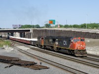 CN 527 has a varied lashup of CN 5741, NS 8374 & CN 4807 as it passes through Turcot West. At left is where CN's main line will shift to before the end of the year.