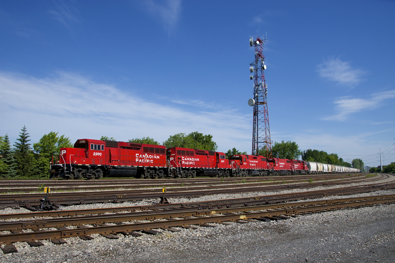 CP 2280, CP 2307, CP 3024, CP 4417 & CP 2205 lead CP F94 past Lasalle Yard. In a bit over seven miles they will set the first two units off for local service in Delson.