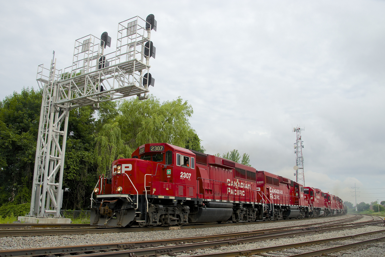 Three GP20C-ECO's and two GP38-2's let out quite the roar as they speed CP F94 through Lasalle.
