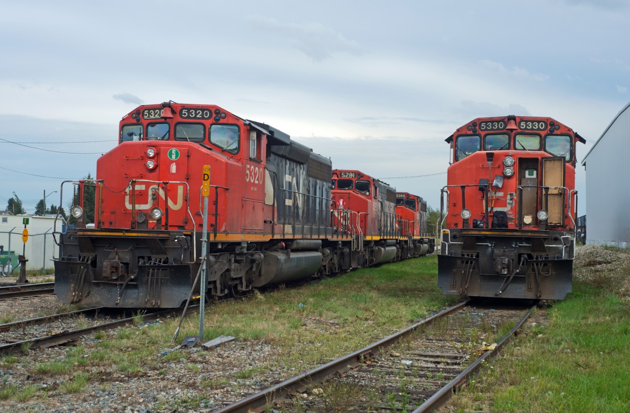 CN 5320, 5281, 5263, and 5330 await their next task's in Whitecourt AB. There was a 2400 tucked away behind 5330 as well, but no one needs to know that.