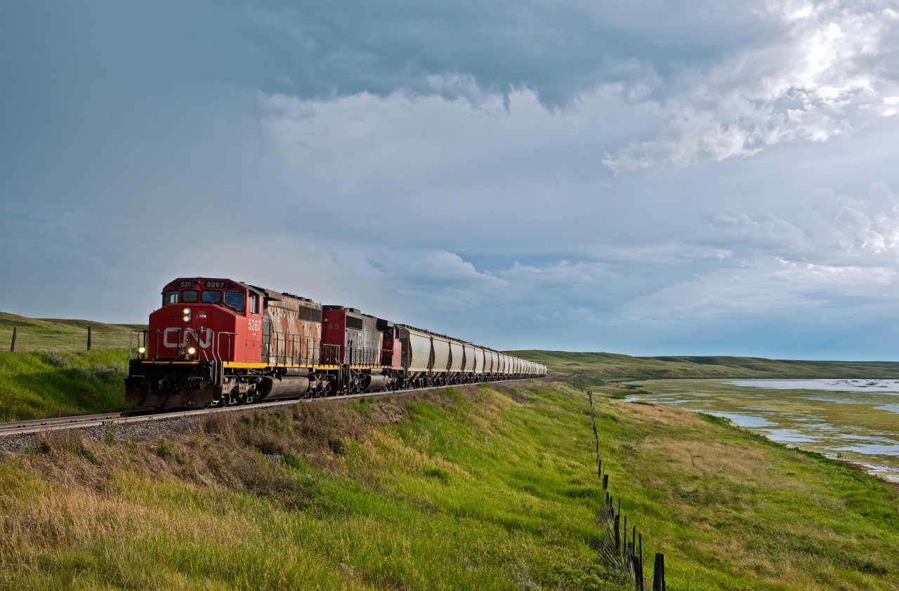 CN SD40-2W's 5267 and 5358 lead L510 along the remaining portion of the Oyen Sub at a whopping 10mph !