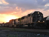 IC 1005 - GECX 7375 lead 91 cars through Brantford on train 398.