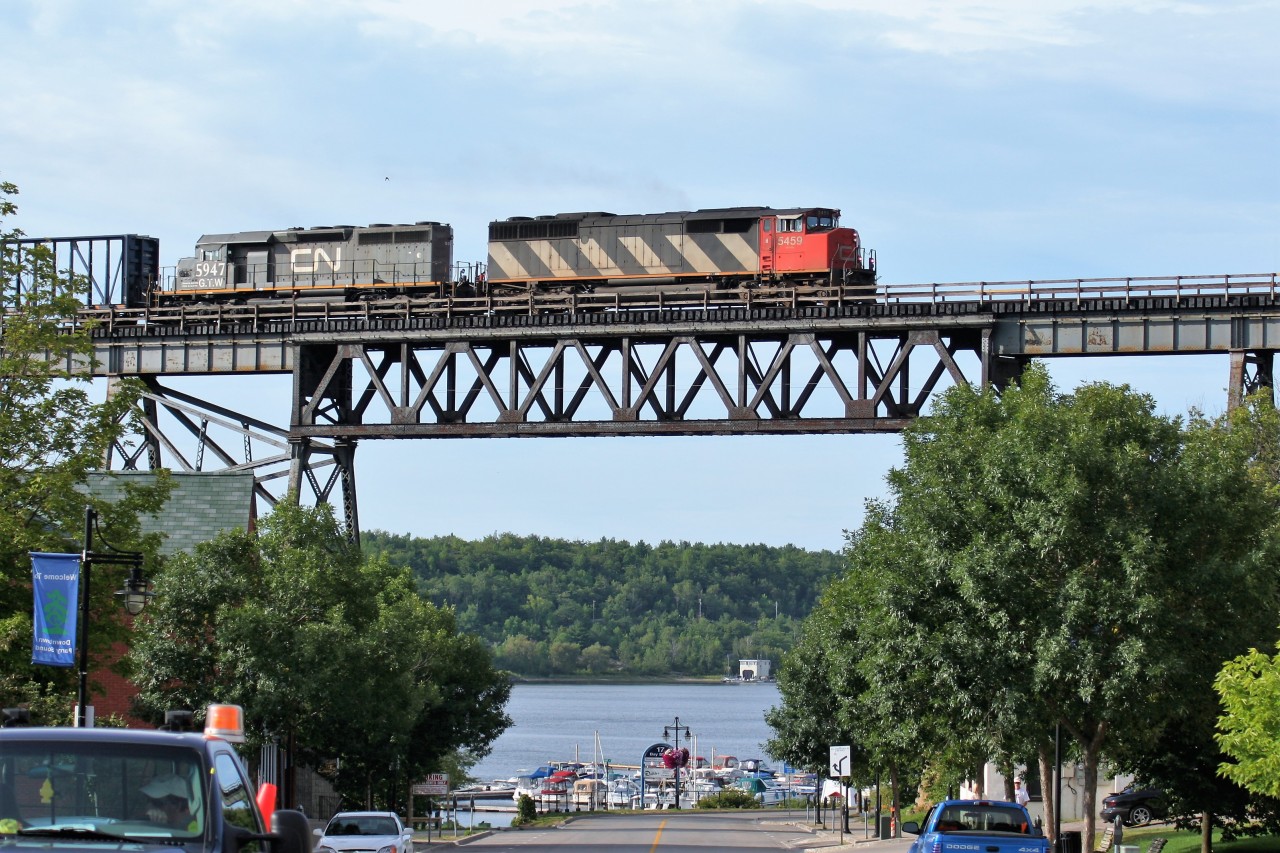 It's hard to believe I took this more than 10 years ago. CN SD50F 5459 and GTW SD40-3 5947 lead a northbound train over the Seguin River in Parry Sound, Ontario. The train is crossing the large 1695 foot trestle bridge which was built during 1907 and stands 115 feet above the Seguin River and the Parry Sound Harbor.