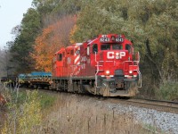 CP GP9u's 8243 and 8229 lead a short train 141 at Orrs Lake hill, west of Galt, Ontario on the Galt Subdivision as they head westward towards St. Thomas. 