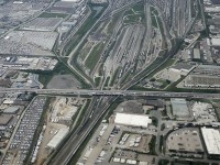 An overview of Mac Yard while landing at YYZ. L(Local) yard is the bottom centre and then left to right West Control, C yard ( the receivers for cars coing over the Dual Hump, East Control and  R (Receiving ) is the farthest to the right. The shops are in the top left corner. The Car Repair shop is just left of L yard, but appears to be all but abandoned. It was always full back in the 80's be it repairs, or "cleaners"; box cars in to be cleaned out. In the top right; well that used to be ConPort, which has moved to BIT, so I assume it's now an auto transloading operation.