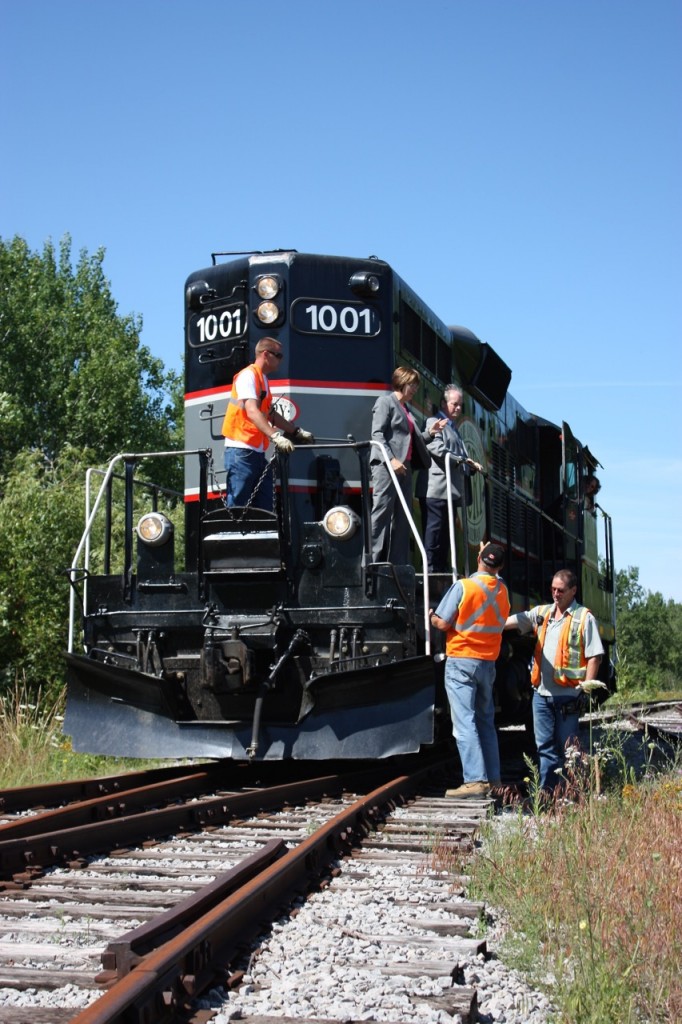 While city officials tried to lighten the mood, this day and event for railroaders and railfans alike was a sad affair. July 14, 2011 marked the last day of rail service to the town of Collingwood. Barrie - Collingwood's GP9 #1000 ran to the end of serviceable track in town, stopping for a short celebration of the towns railroad history before the train and crew returned to work lifting tank cars from the last two customers in town, later retracing its steps back to Utopia for the very last time. It was several weeks since the train originally dropped the cars in town and that type of service can not justify a lines survival. Today most of the rails to Collingwood are still intact but the possibilities of rail service ever returning is very slim.