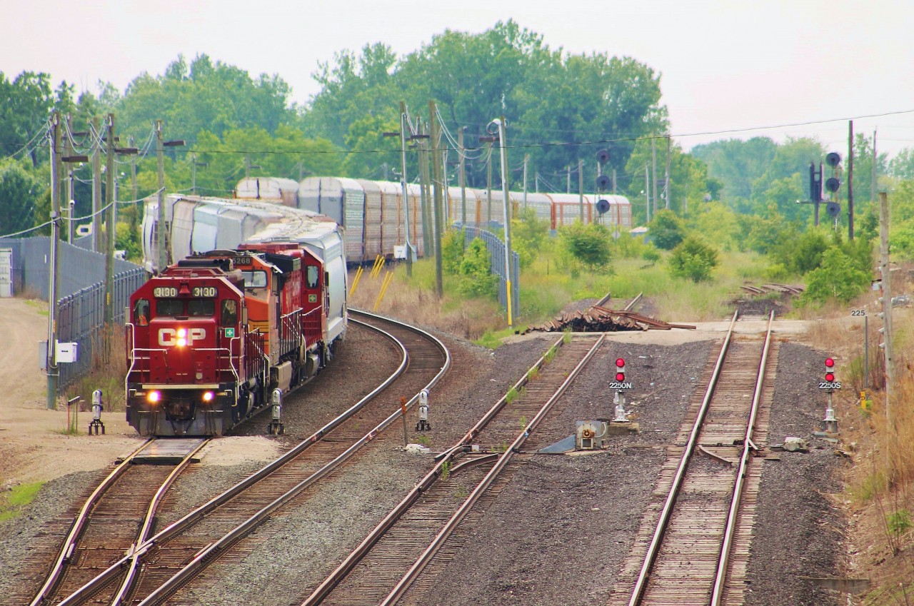 CP T-27 passes the dwarf signals protecting the interlocking between the CASO Connector and what was once the CASO Sub at College. Both the CASO Connector and the CASO leading up to the tunnel in Windsor are considered to be part of the Windsor Subdivision now. The searchlights at CN Windsor South on the CASO have been turned off leaving locals wondering what CN plans to do with the once busy interlocking that hosted several railroads. No trains have used the north main into Van De Water Yard for several years.