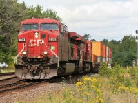 A southbound Canadian Pacific train with AC4400CW 9803 is coming off the CN Bala Subdivision at Boyne Junction and will diverge back onto the CP Parry Sound Subdivision to continue it's journey to MacTier and eventually Toronto.  
