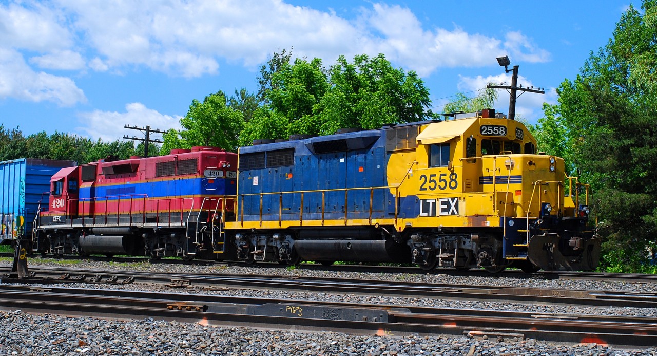LTEX 2558 a EMD-GP-35 and CEFX 420 a GP-38-3 working in Farnham yard toset next convoy