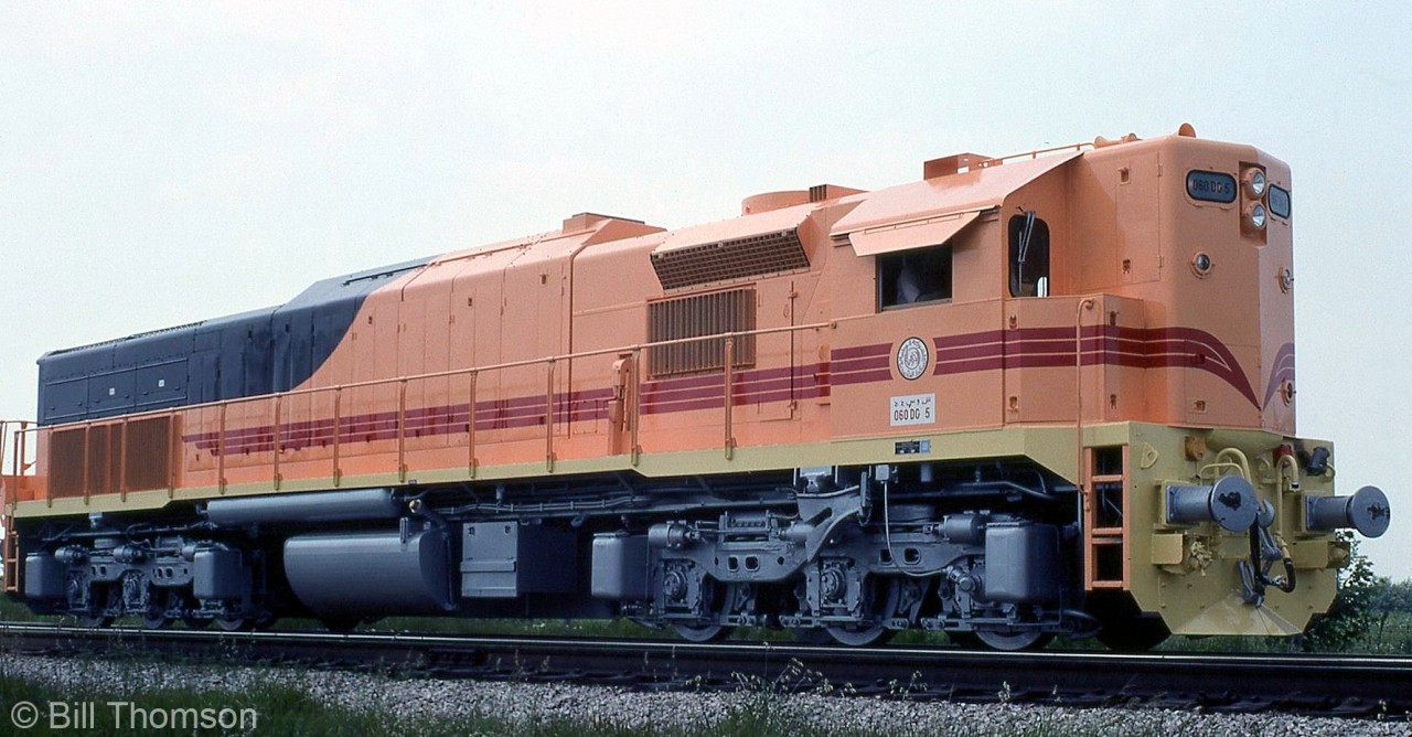 As well as manufacturing locomotives for the domestic market, EMD also manufactured many export locomotives for other countries, often of a unique design different from what was being produced for the North American Market. Many of those units were built at the GMD London, Ontario plant over the years, and traveled via CN or CP to port for export overseas (the London plant was making units for both domestic and export markets up until it was closed in 2012). Others were manufactured overseas by EMD or under license to other companies.

Seen here is a brand new EMD GT26CW or "060 DG"-class unit built in 1976 for Société Nationale des Transports Ferroviaires (SNTF) in Algeria, and numbered 060DG5. Notable are the low-profile carbody and cab, high short hood, buffer-and-hook couplers, export trucks with truck-mounted sandboxes, and a rear radiator setup similar in design to the SP "Tunnel Motor" SD45T-2's.

The popular EMD GT26 locomomotive was a 6-axle 2400hp 645-powered export locomotive similar to the SD40 that was built for the export market, including buyers in Australia, Algeria, Yugoslavia, Pakistan, Iran, Brazil, South Africa, Turkey and South Korea.