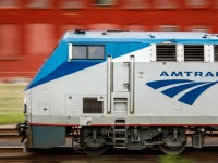 The Amtrak Maple Leaf glides through Steeltown as it nears the end of its journey from New York City to Toronto. Hamilton locals might recognize the brick building in the background, which given the train, made for an aptly coloured scene of red, white and blue.