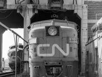 CN 6786 sits under the out-of-use coaling tower in CN's Spadina engine facility in Toronto in September 1969.