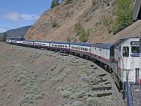 It was a hot afternoon as we were descending the BC Rail Kelly Lake Hill at approximately mile 184. It is a twisty winding trip down the hill starting at mile 191 and reaching the bottom of the grade at mile 160, descending 31 miles and losing approximately 814 feet of altitude.  Sorry, I cannot pin point the location on the satellite.