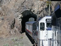 exiting a short tunnel at mile 185.6 on the BC Rail Lillooet sub,as the RMR Fraser Discovery continues the south journey to Whistler.  sorry I could not locate this area on the satellite image.