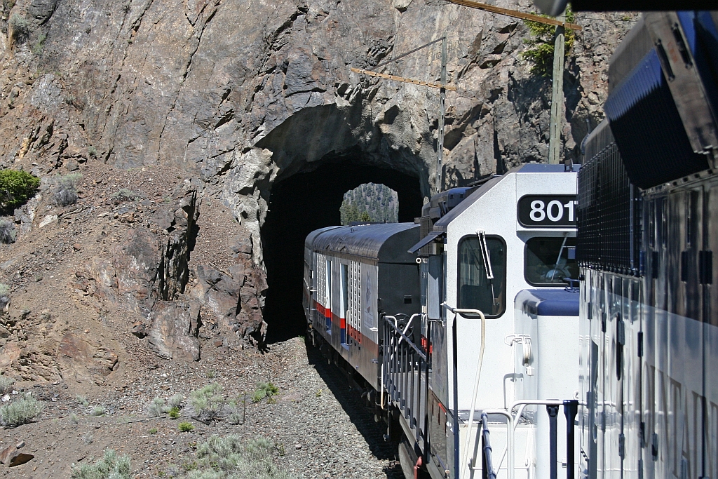 exiting a short tunnel at mile 185.6 on the BC Rail Lillooet sub,as the RMR Fraser Discovery continues the south journey to Whistler.  sorry I could not locate this area on the satellite image.