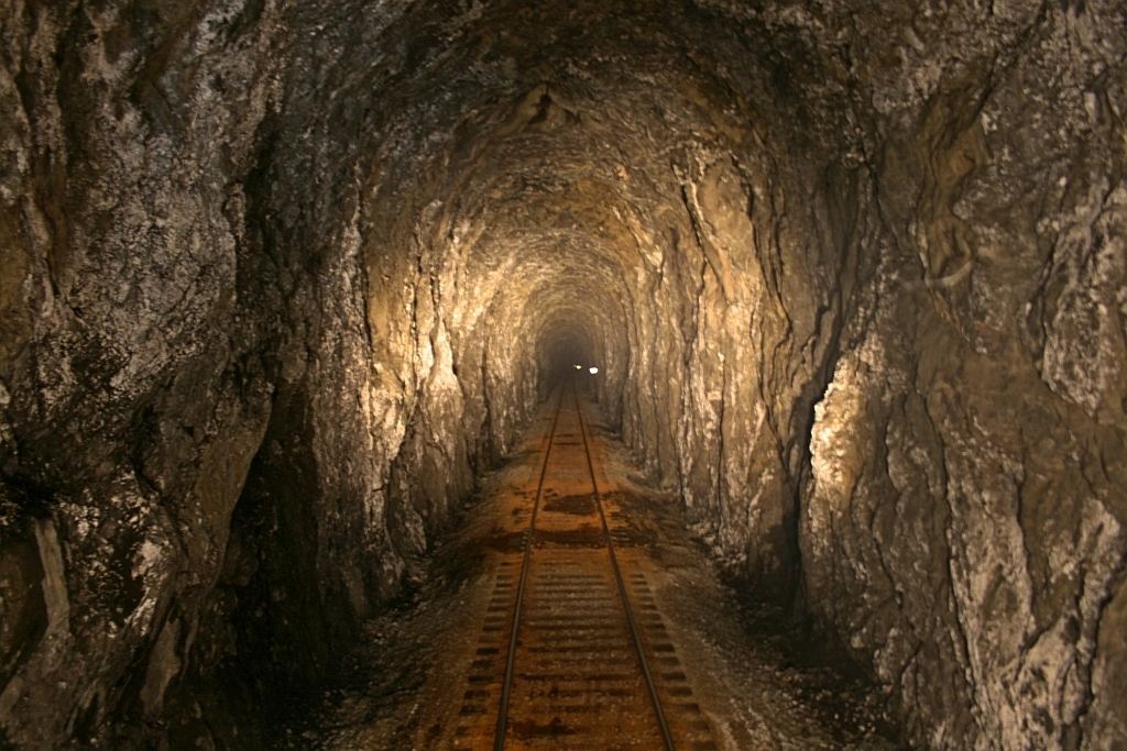 stopped just inside the south portal of the 3,800 foot long Shalalth tunnel. I seem to recall that we had had a meet at Seton siding and had just pulled out of the north end and were in the process of "restore to normal position" the north switch. I don't know if it was coincidence or convenience that the Conductor's portable radio failed and while stopped waiting for further communication, I had the opportunity of a good image inside the tunnel. Eventually the Conductor arrived in the cab, confirmed that the switch was lined and locked normal and we could proceed. I have been in numerous tunnels and they all seem to have the same dank, sour smell, leaving me with a strong sense that it is not normal to be underground.
