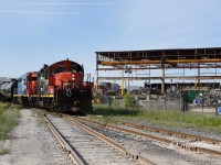CN 7200 with GT 6420 work the IOX job, meanwhile demolition of the ESSO Lube plant is going fast and furious.