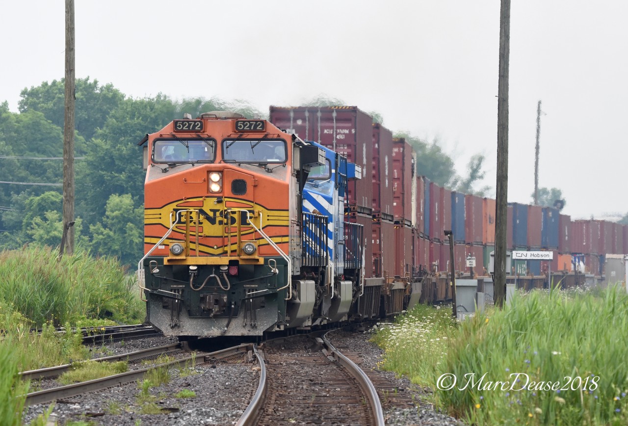 BNSF 5272 with CEFX 1017 roll past Hobson leading train 148 into Sarnia. The CEFX unit would be dropped in Sarnia and IC 2455 would assume the lead.