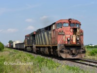 With only 3500 feet of train CN 2426 flies by Fairweather Road heading east back to London.