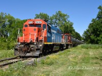 Gt 6420 now coupled with CN 1412 cross Tashmoo Road on the St. Clair Industrial job serving CI Industries and NOVA Chemicals.