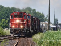 A rare CP leader on train 504 into Sarnia from Port Huron MI. CP 5046 with CN 2201 and CN 2099 roll past Hobson. 