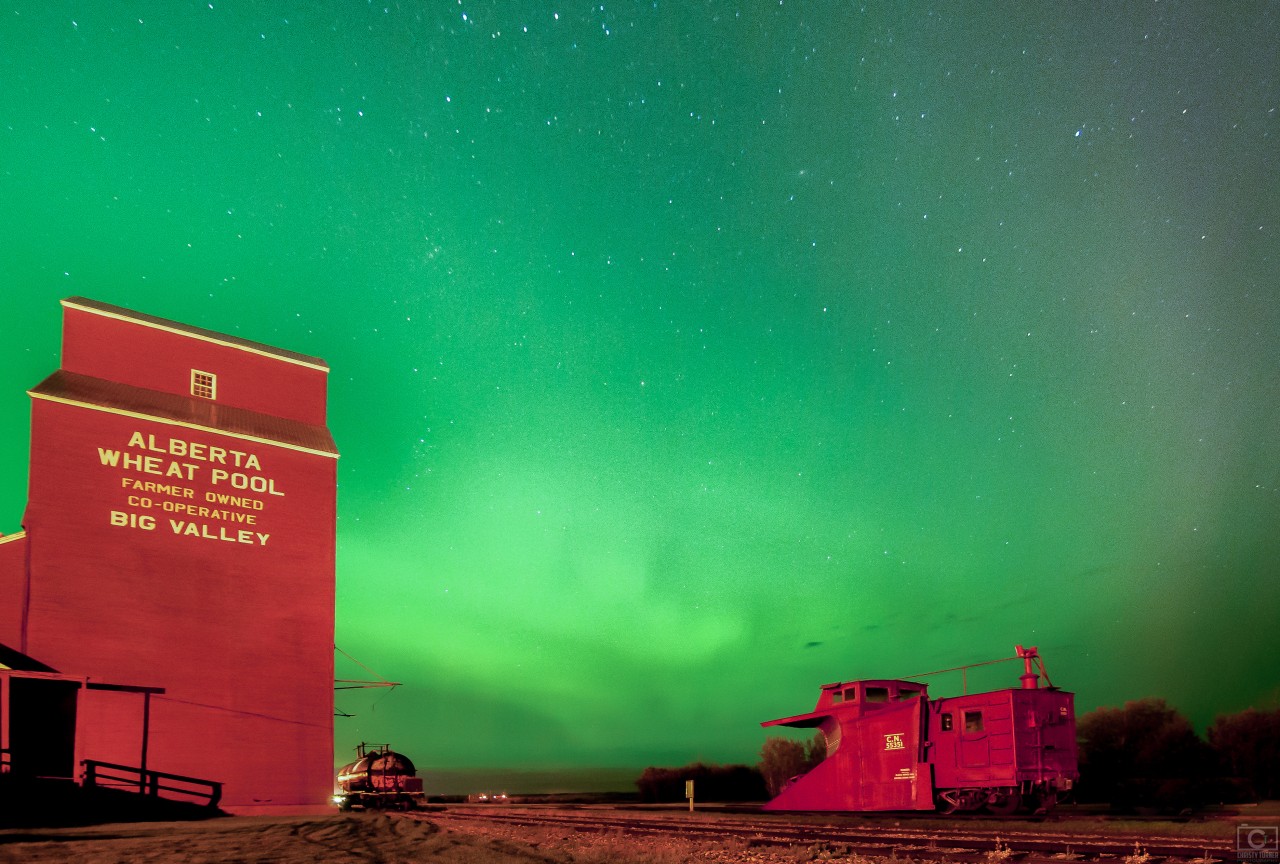 I pulled over at this historic train station in Big Valley as the northern lights filled the sky.This caboose, an ex-CNR car, #79146,  was built in the late 1950s on the frame of an ancient boxcar.