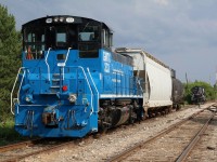 “Changing of the guard” Trillium’s power for the former Cando operation out of Orangeville has finally arrived at Streetsville. Here we see past and present power for the OBRY sitting in the yard. The former Milwaukee Road MP15 was relocated from Trillium’s other operation in the Niagara Region and may only be temporary power for the line out of Orangeville. Cando’s last run over the line was on June 30 to drop the GP9 in the background, while Trillum will head north on July 2 for the first time. It’s interesting that CP local T14 did not lift the GP9 on its return trip to Toronto, maybe the paperwork wasn’t approved yet for shipping?