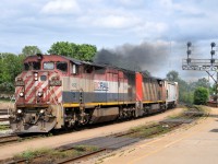 A43531 28 throttles up as they make their way through Brantford with BCOL 4625, CN 2416, and 44 cars.

