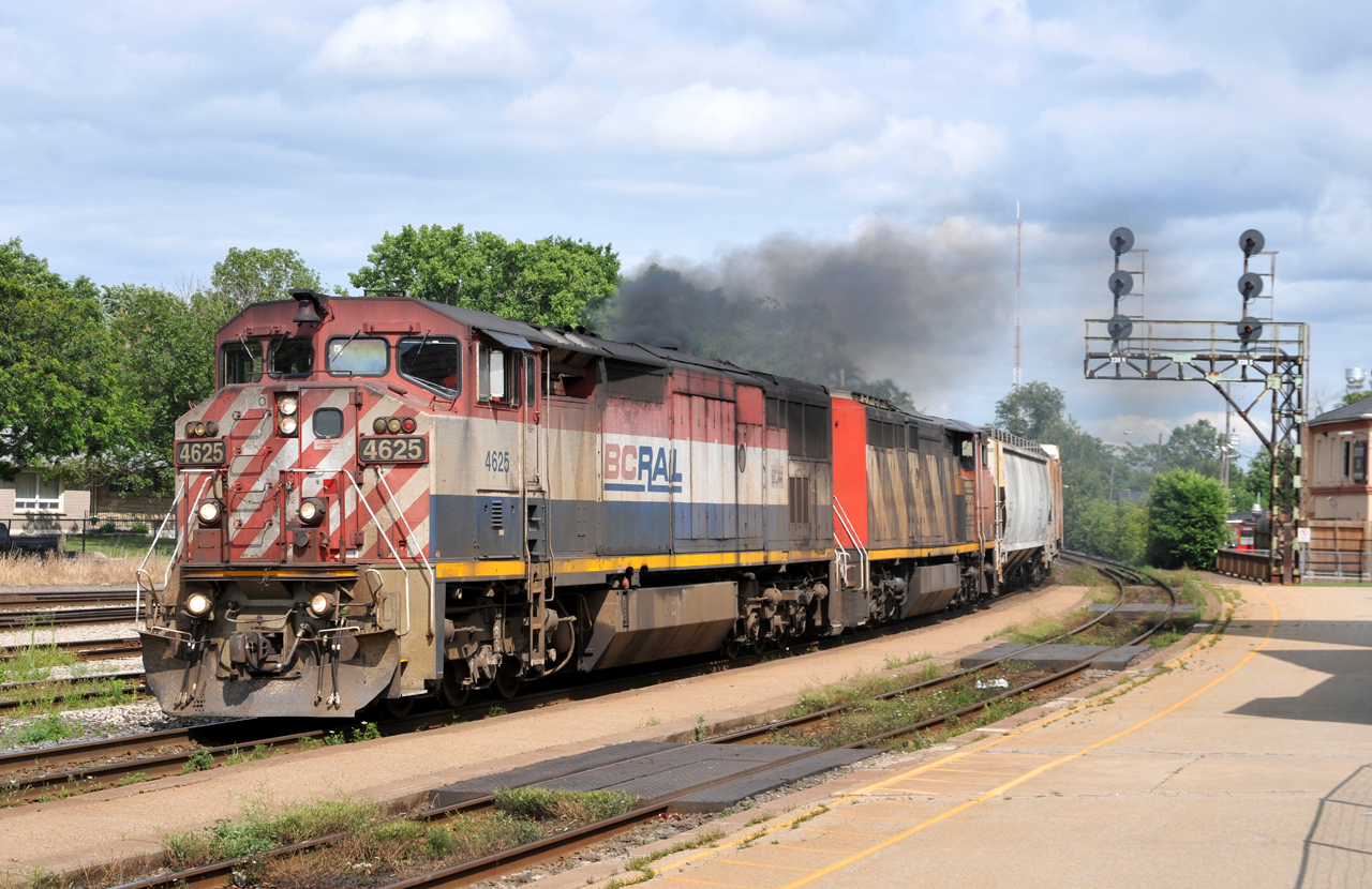 A43531 28 throttles up as they make their way through Brantford with BCOL 4625, CN 2416, and 44 cars.