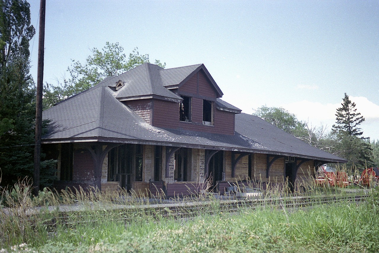 Here is another one of those long-forgotten rural stations that so used to dot the Ontario landscape. This is the former CP station at Bruce,a couple of miles up from Bruce Mines off Trans-Canada Hwy 17. Many years ago a small community sprung up here due to it being a junction of the CP and the Lake Huron & Northern Ontario Rwy. A line ran north about 15 miles to Rock Lake, where there was a busy copper mine operation. That is all gone now, everything quiet, and you can see in this photo taken 41 years ago tomorrow as I post this, that the station is not being demolished, but dismantled. I wonder where most of it ended up?