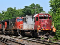 M38531 01's power (CN 8838, CN 2651, CEFX 6007) headed back to their train after finishing up a set-off at Brantford.

CEFX 6007 is still sporting mostly original SOO colors, along with Indiana Railroad nose markings from its time on INRD in the mid 2000's