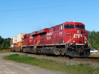 CP ES44AC units 8715 and 8814 head a westbound freight through Roblindale, at Mile 68.7 of the Belleville Sub on August 28th 2009.