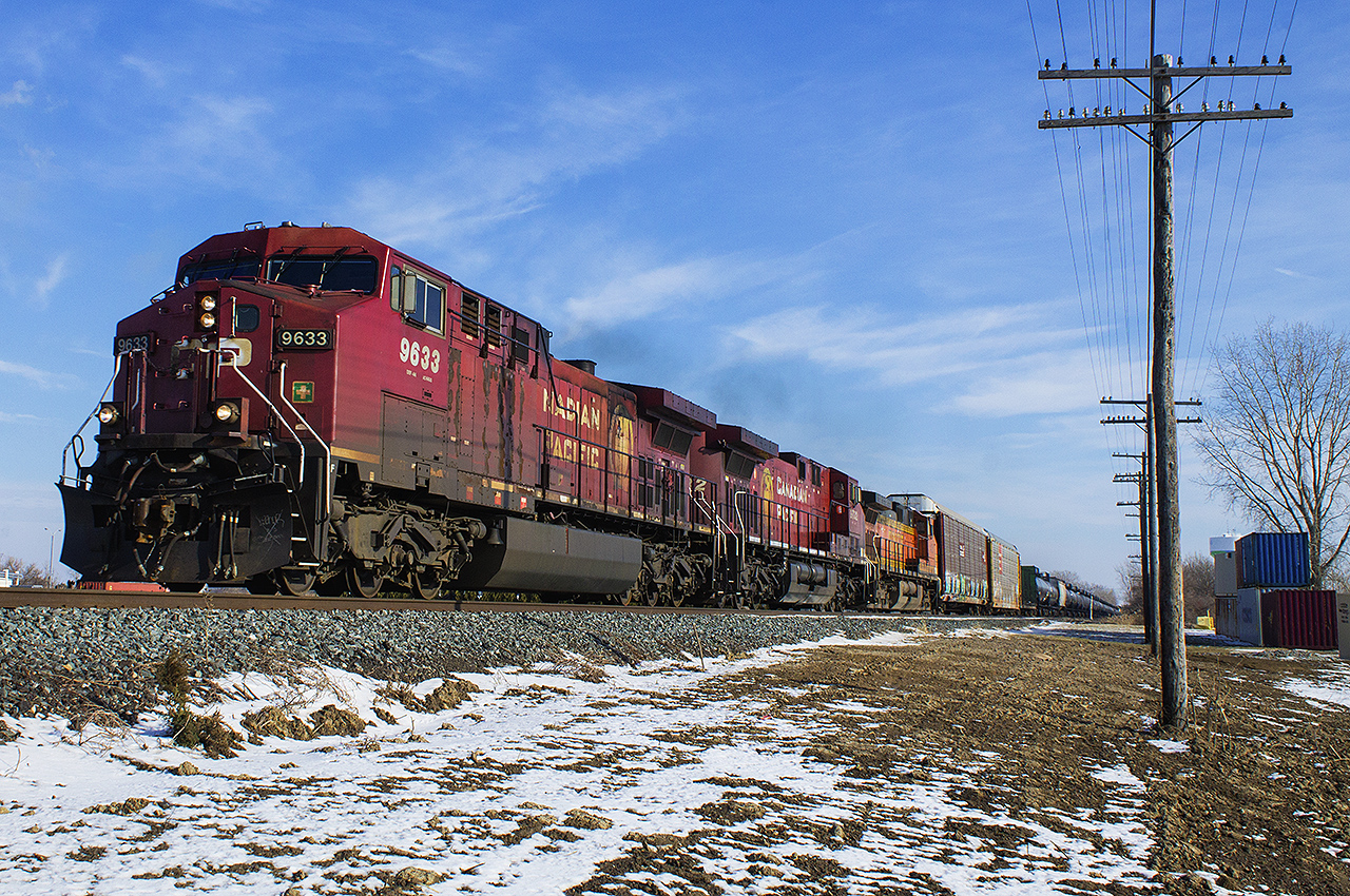 The winter of 201 proved to be a harsh one, forcing foamers alike from all over to stay indoors. However, some days weren't so bad - both weather wise and having foreign power in Ontario. On a rare sunny day, CP 9633 & 9732, along with BNSF 4151 hustle their train west out of Chatham.