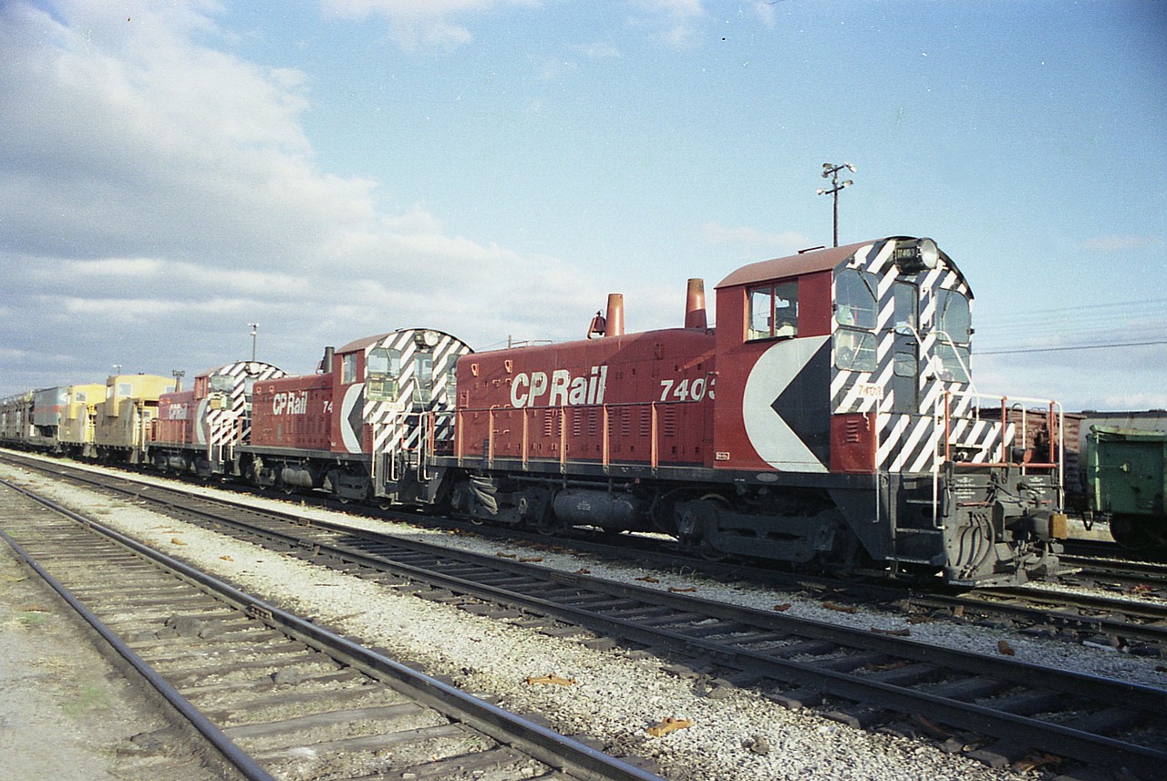 Those little GMD SW9 switchers were not exactly common on CP.  They only had 6 on the roster. And here are three of them, at rest between switching Agincourt Yard. CP 7403, 7402 and 7405. These units, part of an order 7400-7405 were built in 1953 and eventually renumbered in 1982/83 to 1200-1205 before being rebuilt/sold/retired.