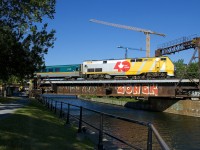 VIA 33 from Quebec City is crossing the Lachine Canal with VIA 912 for power.