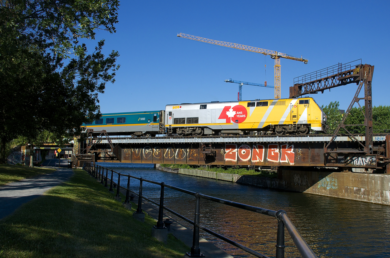 VIA 33 from Quebec City is crossing the Lachine Canal with VIA 912 for power.