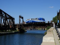 Calling itself the roustabout on the scanner, this light engine move of ALP-45DP AMT 1357 was seen heading east over the Lachine Canal (as seen here) and then backing up towards Central Station in Montreal a few minutes later. Presumably this job switches the nearby Pointe St-Charles Maintenance Centre and brings equipment between there and Central Station.